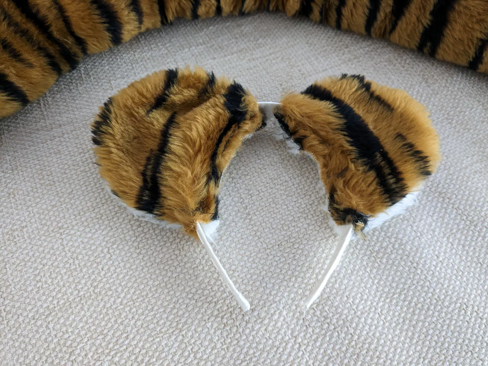 Close-up photo of a hand-made pair of tiger ears